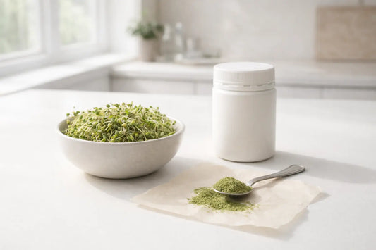 Broccoli sprouts beside an unbranded sulforaphane supplement and green powder on a kitchen bench
