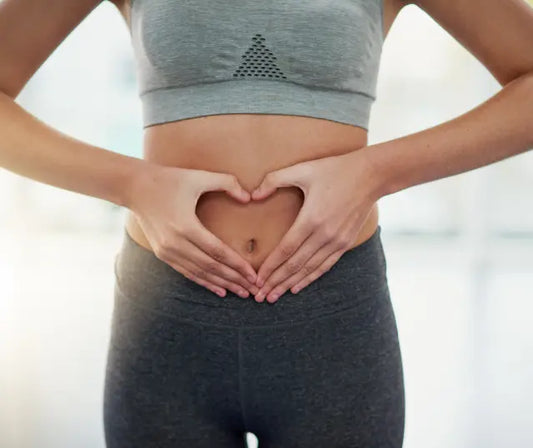 Gut health supplement categories with green and gold kiwifruit on a bright New Zealand benchtop
